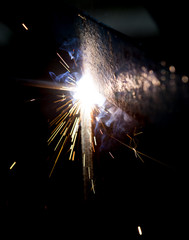 Flash and sparks from electric welding