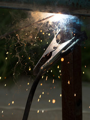 Obraz na płótnie Canvas Flash and sparks from electric welding