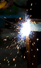 Flash and sparks from electric welding