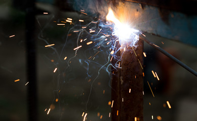 Flash and sparks from electric welding