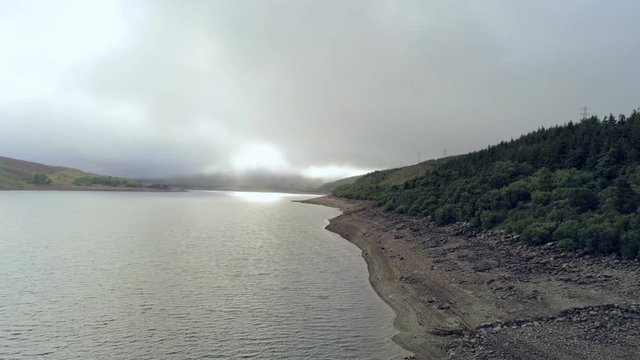 Aerial view, slow move. Drone panorama of Llyn Celyn water reservoir in Wales