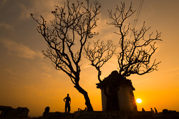 Sunset at Hemakuta Hill, Hampi. Hampi, capital of the Vijayanagara empire, sits on the banks of the Tungabhadra River.