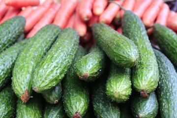 Retail cucumbers and carrots on the market