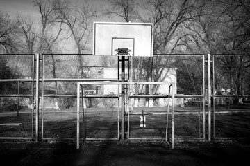 abandoned basketball and football field