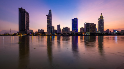 Fototapeta na wymiar Beautiful landscape sunset of Ho Chi Minh city or Sai Gon, Vietnam. Royalty high-quality free stock image of Ho Chi Minh City with skyscraper buildings. Ho Chi Minh city is the biggest city in Vietnam