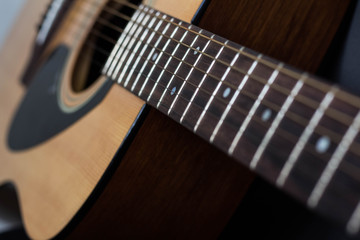 Obraz premium Strings on an acoustic guitar close up