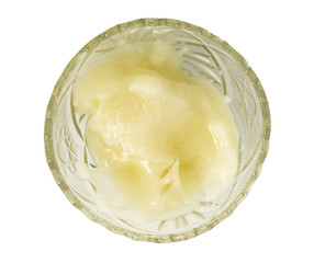 honey on a bowl on a white background