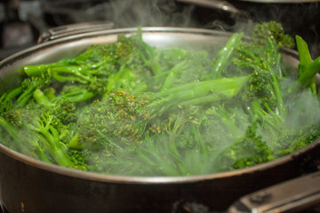 Steaming broccoli in a pot