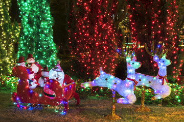 illuminated LED Santa Claus in his sleigh decoration for Christmas