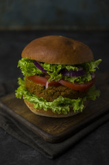 Veggie beet and quinoa burger with avocado
