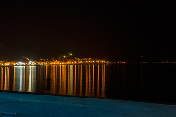 Light on city Baska,with sea and beach, Croatia