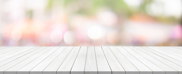white wood table top on blurred background from shopping mall, Space for montage your product