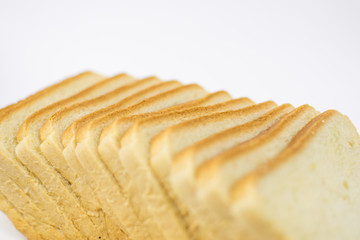 Toast bread on a white plate.