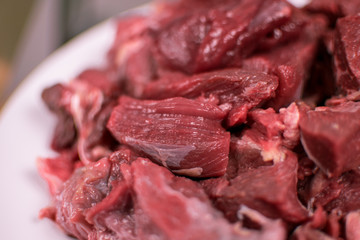 Sliced raw beef.