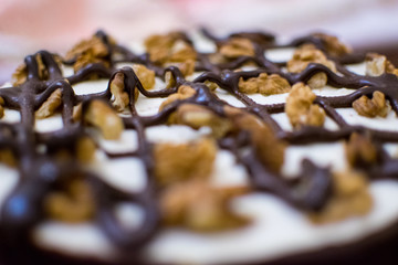 Cake with walnuts and chocolate.