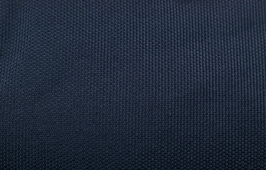 Fototapeta na wymiar Dark background of fabric.