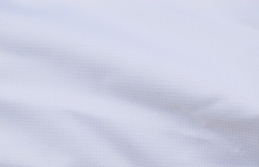 Background of dense white fabric.