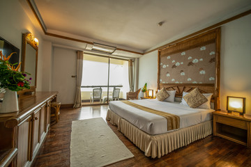 Fototapeta na wymiar interia perspective of double hotel bedroom with one double bed for two persons at Samed Cabana Samed island Rayong district Thailand