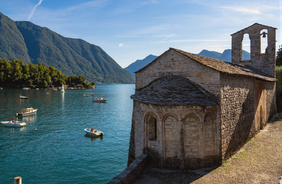 millenary church Romanesque style, in front of Comacina Island, Como Lake. Italy