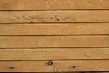 Obraz premium Yellow wooden planks wall background