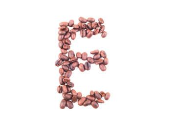 The alphabet E from roasted coffee beans. Isolated. White background.