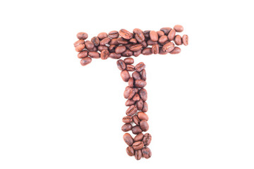The alphabet T from roasted coffee beans. Isolated. White background.