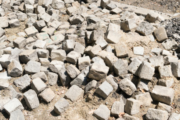Reconstruction of Grey Old Stone Pavement Top View or Granite Cobblestone Road