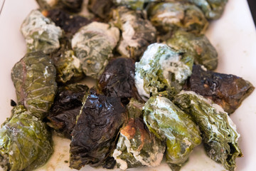 Palusami: traditional Samoan meal of young taro vegetable leaves cooked in coconut milk
