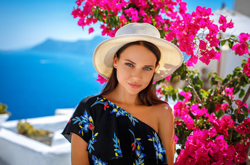 Naklejka premium beautiful summer girl portrait on Santorini