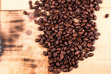 coffee beans on wooden background