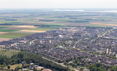 Aerial view Dutch village Urk with new build residential area in agricultural landscape