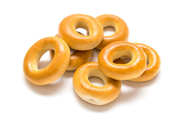Small bagels, small rolls on a white background.