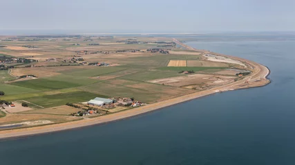 Zelfklevend Fotobehang Aerial view farmland of east side Dutch island Texel in Wadden sea © Kruwt