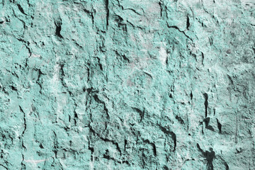 close-up view of light blue weathered wall texture