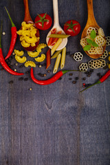 Different pasta in spoons