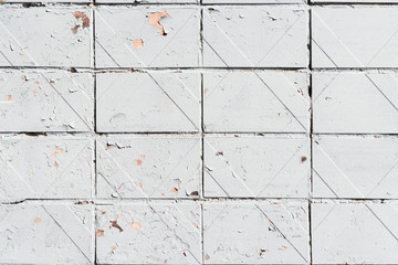 close-up view of old white weathered brick wall textured background