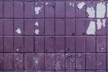 old weathered violet brick wall background