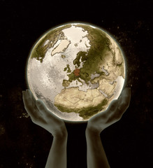 Germany on globe win hands