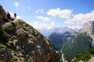 Hikers on steep trail up Monte piana