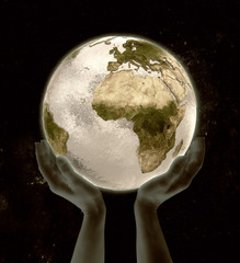 Togo on globe win hands