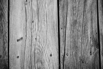 Rough wooden vertical planks background. Old rustic texture of the door.