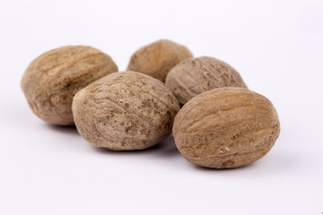 Nutmeg on the white background