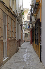 Fototapeta na wymiar narrow street in the old city of Seville
