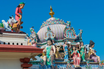 Naklejka premium The colorful Statue of Sri Mariamman the oldest Hindu temple Chinatown travel destination in Singapore with blue sky