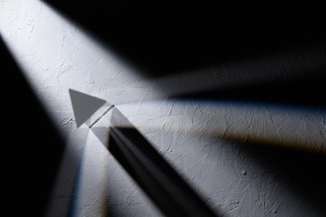 Optical prism refracting light top view © nevodka.com