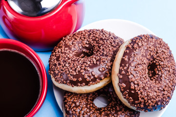Donut. Sweet food and cup of coffee and teapot