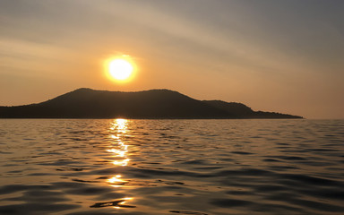 Fototapeta premium Skyscrape in the sunset on the ocean