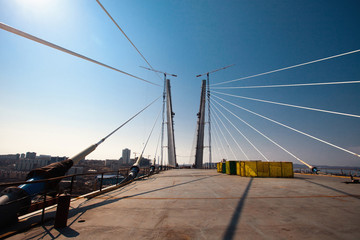 Fototapeta premium Construction of the bridge birches in Golden Horn Bay in 2012 to the APEC SUMMIT. The Golden Bridge in Vladivostok