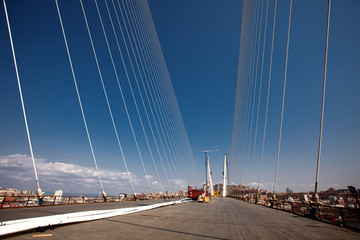 Fototapeta premium Construction of the bridge birches in Golden Horn Bay in 2012 to the APEC SUMMIT. The Golden Bridge in Vladivostok