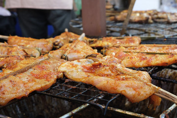 Roasting or grilled chicken on street food market